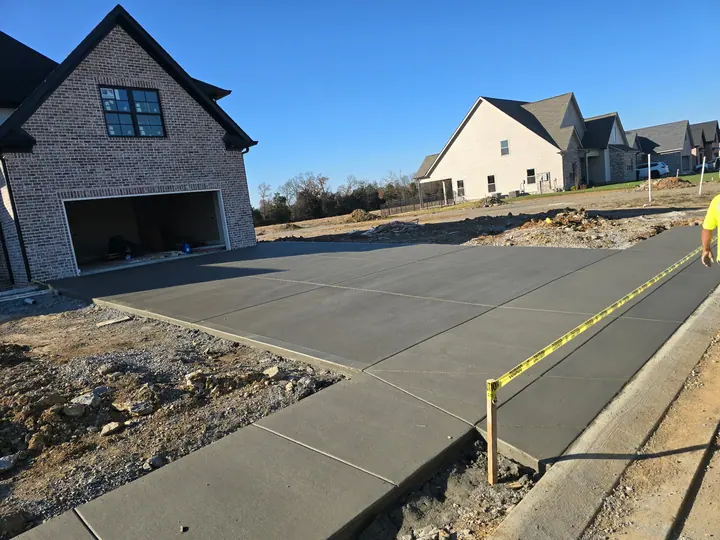 Large finished residential concrete driveway and walkways