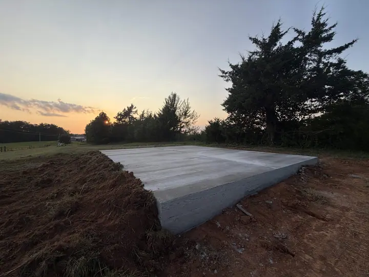 Large completed concrete slab photographed at sunset