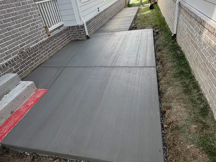 Finished sidewalk connecting two buildings